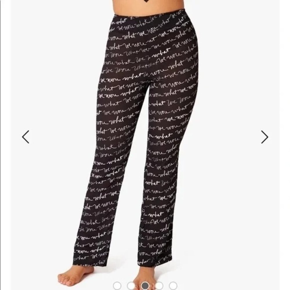 NWT We Wore What Woman's Sz‎ XS Black Sheer Flared Leg Logo Print Smocked Pants